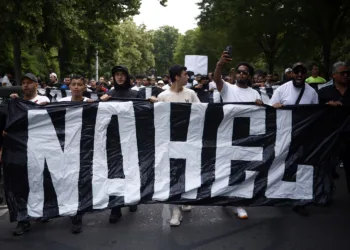 epa10717295 People attend a march in memory of 17-year-old Nahel who was killed by French Police in Nanterre, near Paris, France, 29 June 2023. Violence broke out after the police fatally shot a 17-year-old during a traffic stop in Nanterre on 27 June 2023. According to the French interior minister, 31 people were arrested with 2,000 officers being deployed to prevent further violence.  EPA/YOAN VALAT